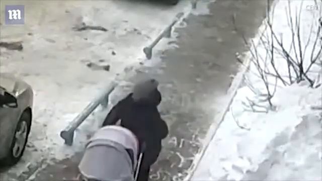 Close call! Mum with pram just avoids being hit by falling window смотреть онлайн