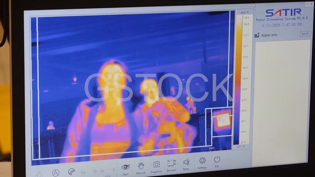 Thermal camera being used at the airport to screen passenger's body temperature. смотреть онлайн