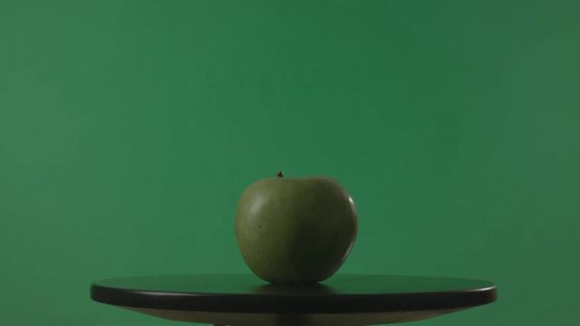 creative concept of individual fresh apple at studio green background shadow falls on fresh apple s смотреть онлайн
