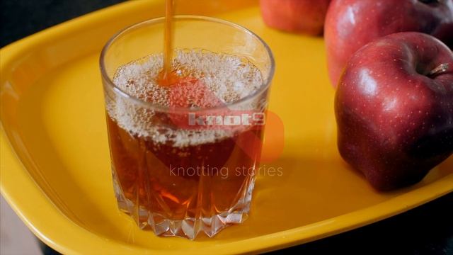 Apple juice being poured into a glass | Indian Stock Footage | Knot9 смотреть онлайн
