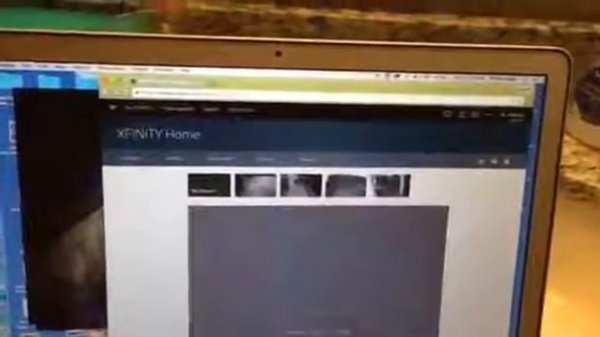 Neighbor peeping over fence through my window at my wife