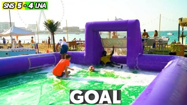 World's BIGGEST Slip N Slide Football Match