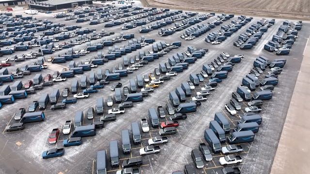 Drone View Of Rivian Factory And Vehicles On Lot смотреть онлайн