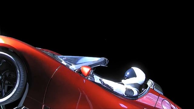 Tesla Roadster & Starman in Space, with Earth in Background смотреть онлайн