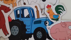 Синий трактор по полям у него в прицепе кто то песенку поёт | пазл синий трактор