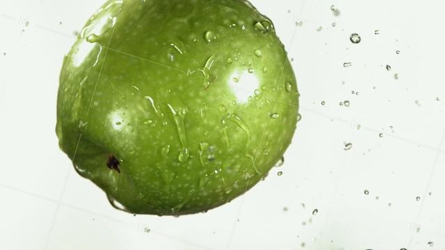 Flying of Green Apple in White Kitchen Background in Slow Motion смотреть онлайн