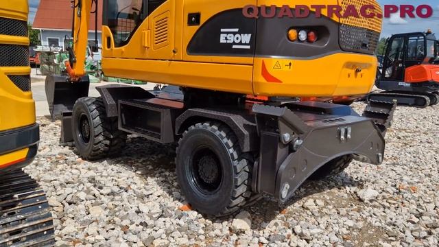 Колесный экскаватор Quadtrac E90W +7-909-630-90-90