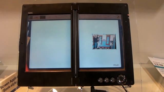 NEC Communicator dual screen tablet at CES 2011 смотреть онлайн