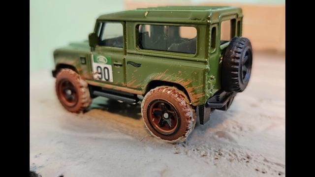 1990 Model LAND ROVER DEFENDER On A Muddy Road