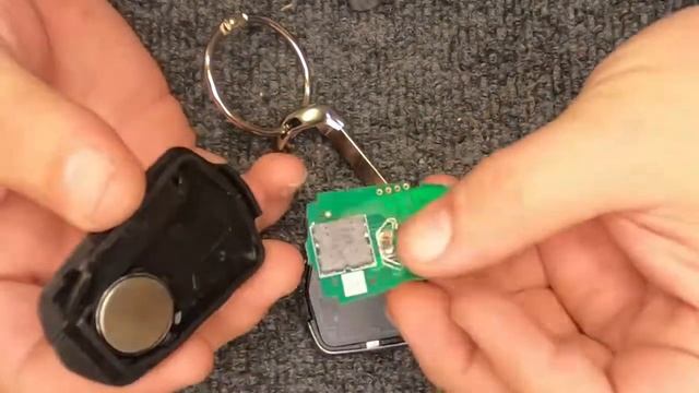 How to replace a 2017 Cadillac CTS 5 button smart key remote battery смотреть онлайн