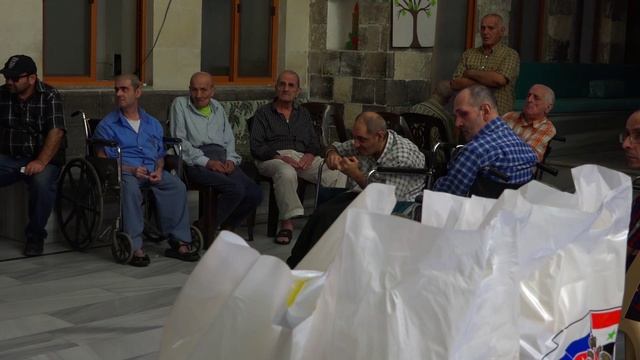 Российские военнослужащие передали гуманитарную помощь людям с ограниченными возможностями в Дамаске смотреть онлайн