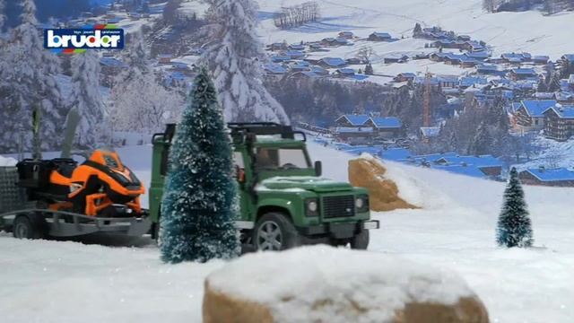 BRUDER Land Rover mit Snowmobil смотреть онлайн
