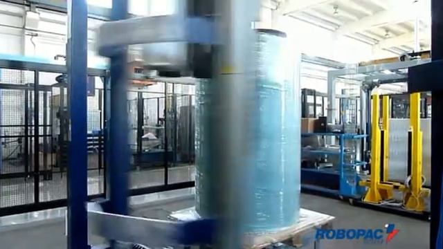 Vertical roll wrapped by Robopac Helix 4 automatic stretch wrapper смотреть онлайн