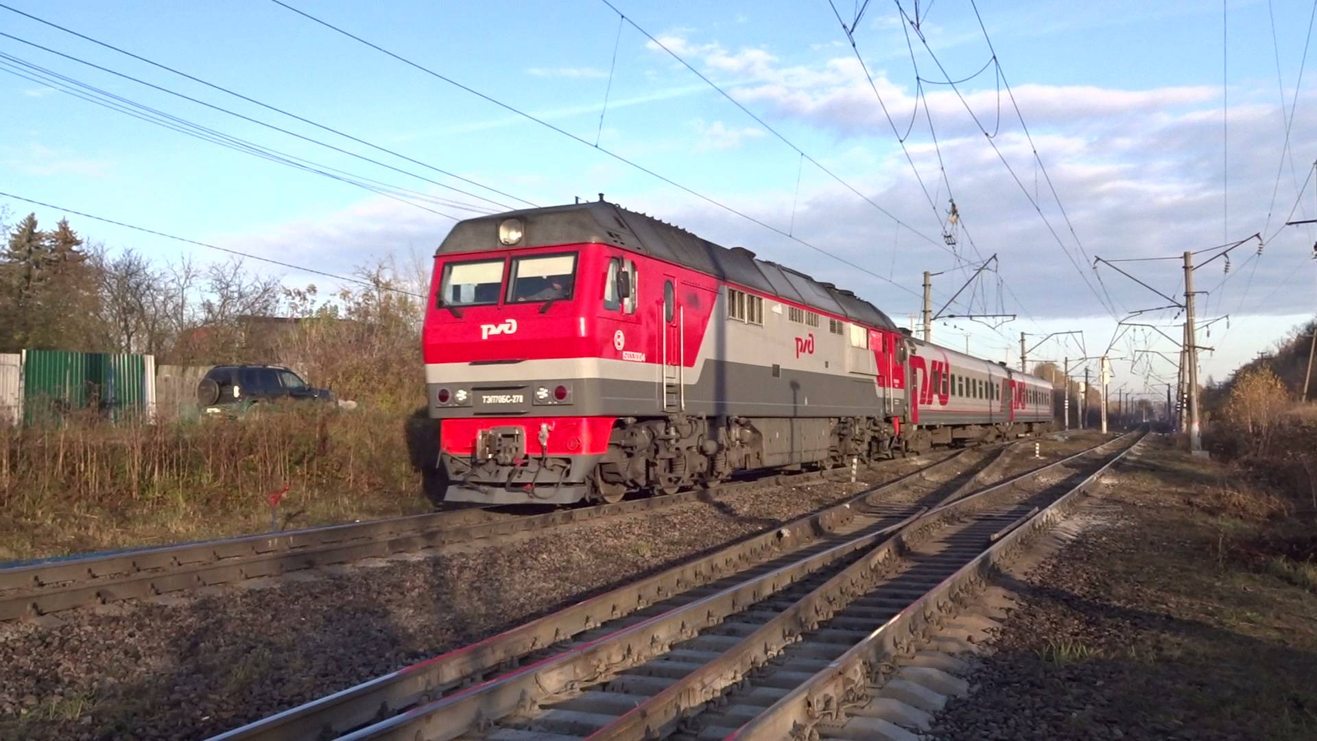 Тепловоз ТЭП70БС-278 с пассажирским поездом Нижний Новгород - Ужовка проходит станцию Окская смотреть онлайн