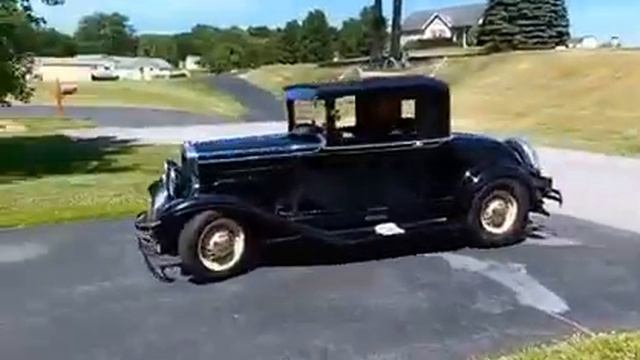 1930 PLYMOUTH COUPE TURNING THE CORNER