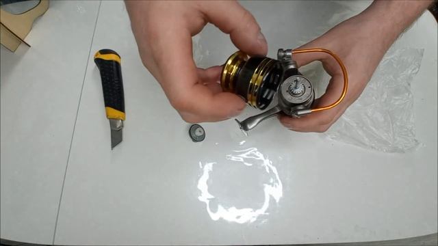 КАтушка Yumoshi  1000  обзор. Катушка для микро джига- мормышенга .Посылка с Аллиэкспрес.