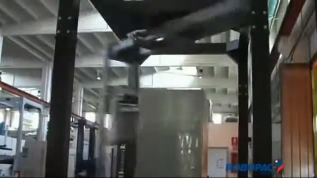 Автоматический паллетоупаковщик с поворотной рукой ROBOPAC HELIX 4 смотреть онлайн