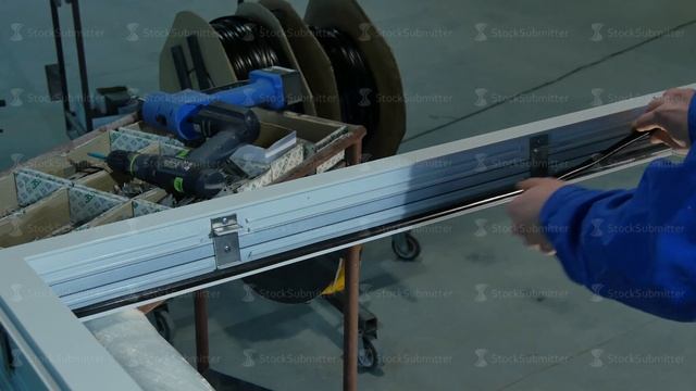 Rubber Insulation for glass and doors. Worker use Window Rubber Seal. self-adhesive seal for glass смотреть онлайн