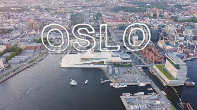 Inscription on video. Oslo, Norway. City view during sunset. Back light. The central part of the ci смотреть онлайн