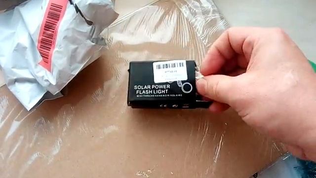 Брелок на ключи, фонарик с солнечной панелью смотреть онлайн