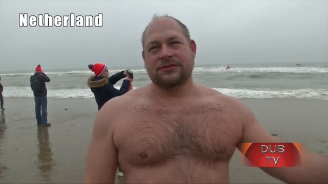 Brave souls take New Year dip into cold water in Europe ! смотреть онлайн
