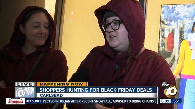 Shoppers brave the rain for the Black Friday deals смотреть онлайн
