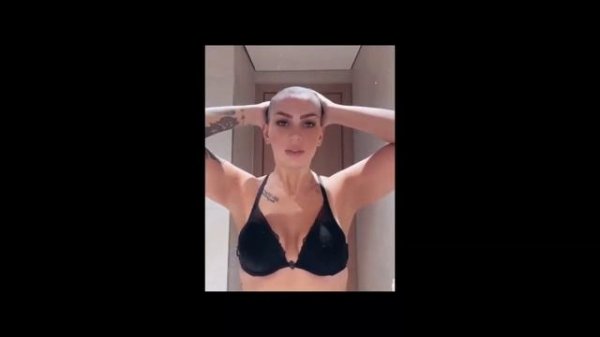 Brave & beautiful Persian singer headshave all of her hair