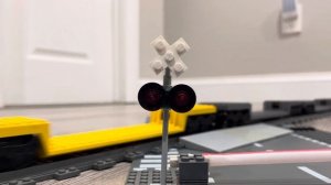 Lego cargo train led by a special locomotive