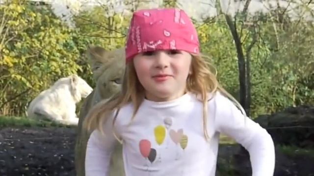 Little Girl Facing The Lion