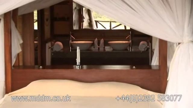 Mara Intrepids safari tented camp Overlooking the Talek River video by Malcolm Dent of MDDM смотреть онлайн