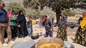 Votive food: The Doora family distributes "Iranian Ash" to the people of region