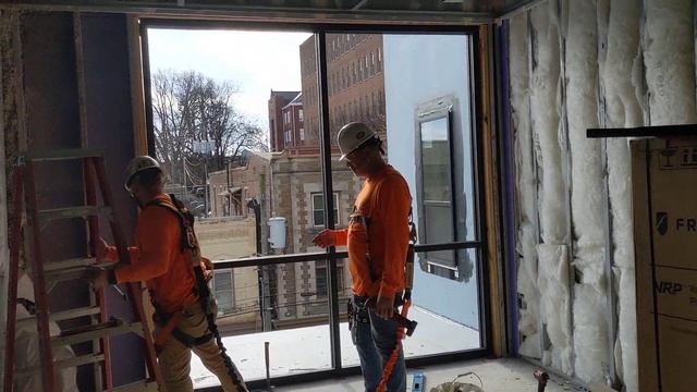 Floor to ceiling windows in community space at elevators and stair смотреть онлайн