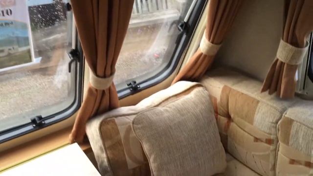 Swift Charisma 550 2010 fixed bed rear washroom touring caravan for sale at North Western Caravans. смотреть онлайн