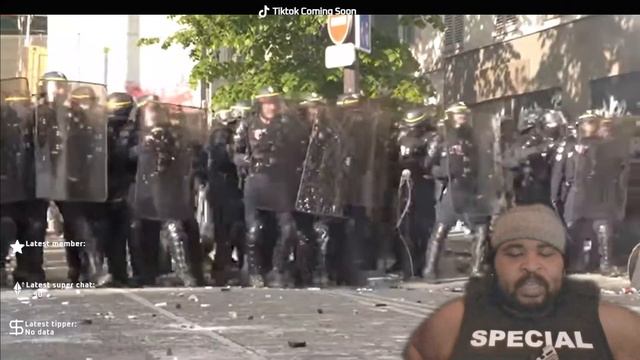 Paris May Day protest turns ugly as police clash with protesters REACTION VIDEO смотреть онлайн