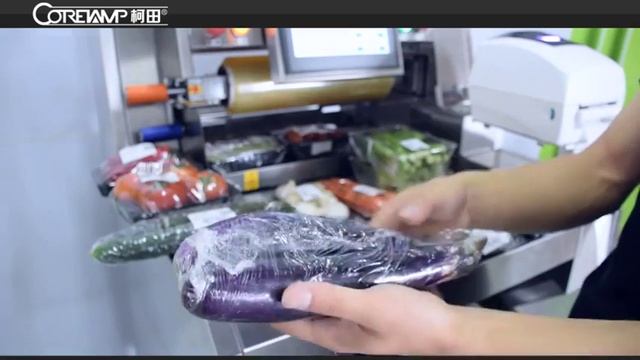 Supermarket vegetables, fruit and meat tray wrapping machine with weiging and label смотреть онлайн