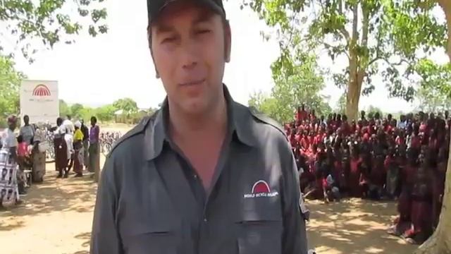 Johan Bruyneel Distributes Bikes to School Children смотреть онлайн
