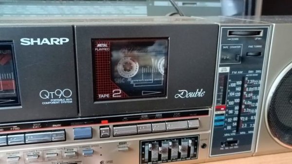 Sharp Qt-90 слушаем смотрим