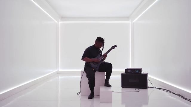 Ernie Ball Music Man: Tosin Abasi Demos The Kaizen Guitar In Apollo Black