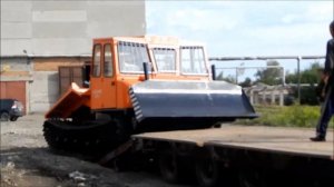 Трелевочный трактор  МСН-10-003-07 с бульдозерным оборудованием. Трехместная кабина.