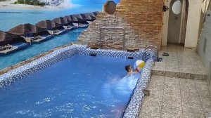 Артёмка катается с горки в бассейн