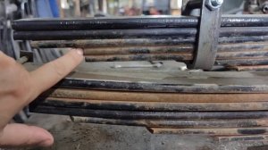 Установка передних и усиление задних рессор Исузу НП для перевозки пятитонного трактора