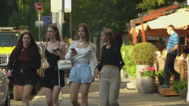 Many Expensive Cars And Beautiful Girls On The Streets Of Moscow.