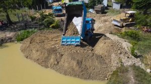 Строительство, новый объект , засыпка  пруда