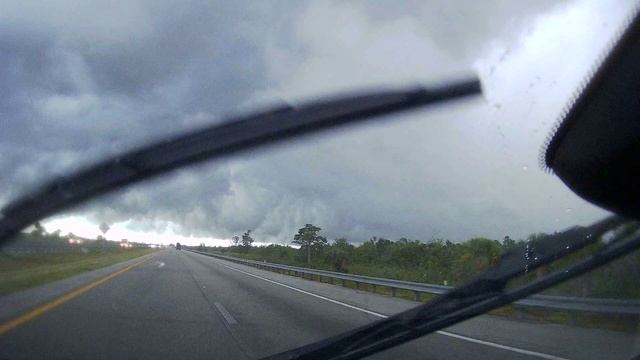 Trip to Kissimmee on Florida's Turnpike heavy rain clouds ahead смотреть онлайн