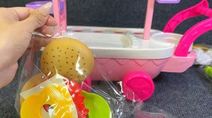 Мультики для малышей. Развивающие игрушки. Распаковка игрушки-тележки с  мороженым и чизбургером