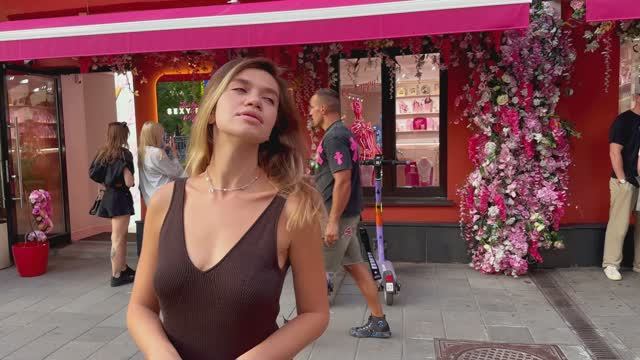 Walk Along The Historical Street Of Moscow. Model Girls Posing For Street Photographers.