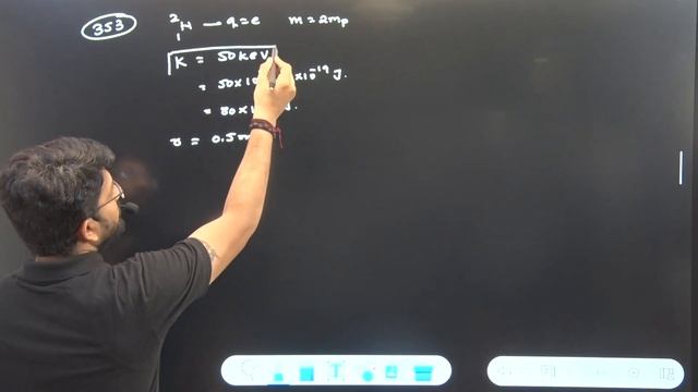 A deutron of kinetic energy 50 keV is describing a circular orbit or radius 0.5 meter in a plane... смотреть онлайн