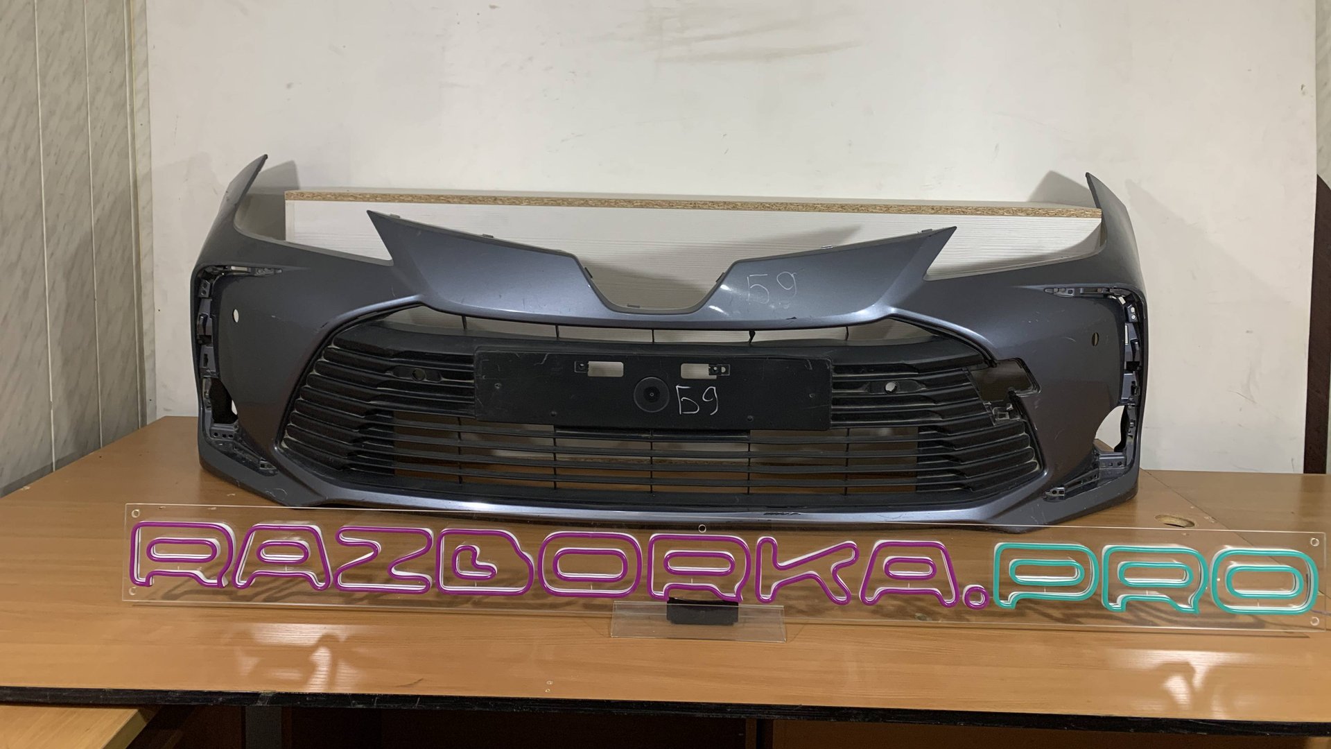 Бампер передний Toyota Corolla E210