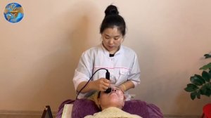 Косметическая процедура на лице с помощью ультразвуковой насадки Fohow