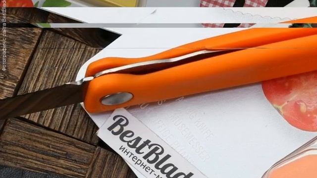Универсальный складной кухонный нож Victorinox (оранжевая рукоять, серрейтор) смотреть онлайн